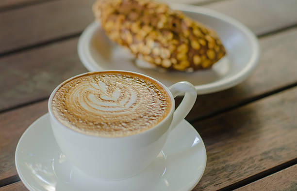 istock Barista making a cup of coffee 520233586