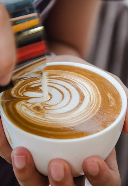 istock Barista making a cup of coffee 520233952