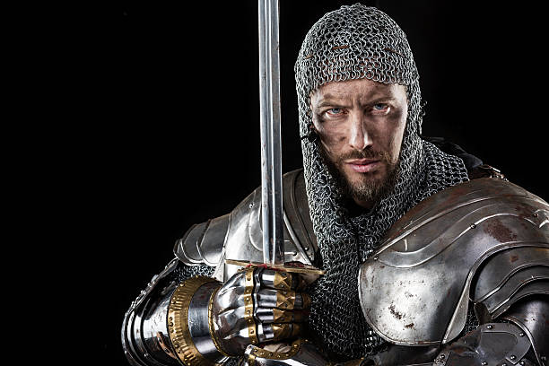 Medieval Warrior with Chain Mail Armour and Sword stock photo