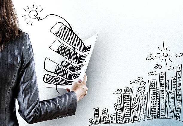 istock Businesswoman holding documents 520243035
