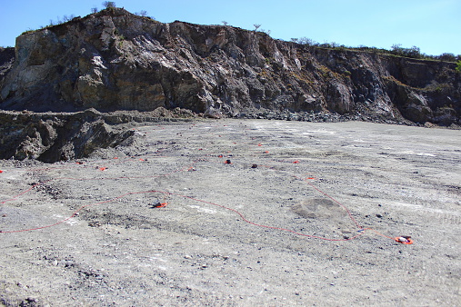 quarry about to be made an explosion with detonators and wicks on the ground
