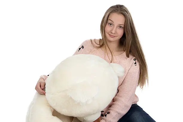 Photo of Portrait of teenage girl with teddy bear