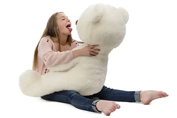 Photo of Photo of naughty teenage girl with teddy bear