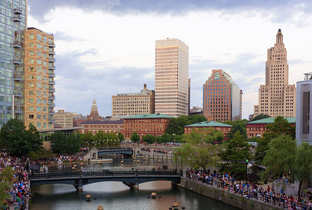 istock Crowds gather along Woonasquatucket river in Providence, RI 520265147