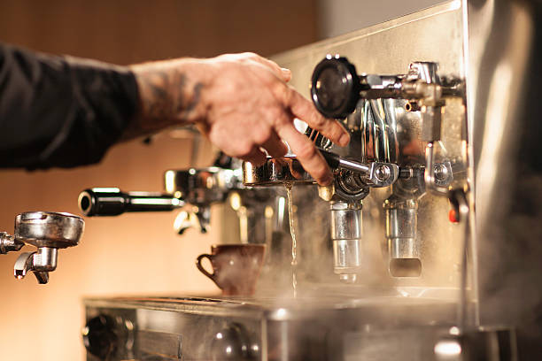 istock Barista making a cup of coffee 520281583