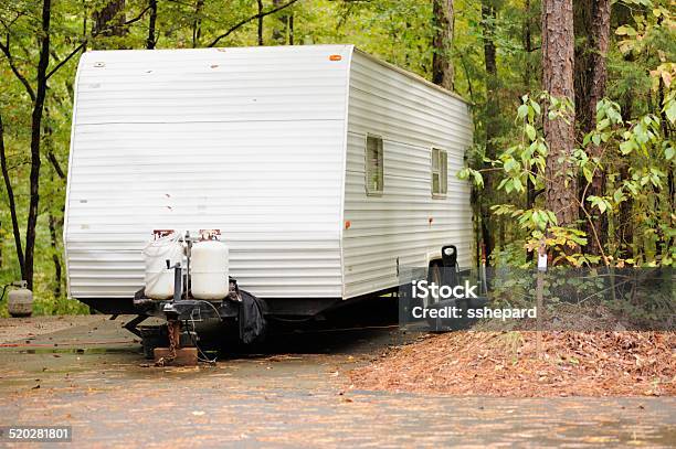 Recreational Vehicle Travel Trailer In Campsite Stock Photo - Download Image Now - Camping, Horizontal, Motor Home