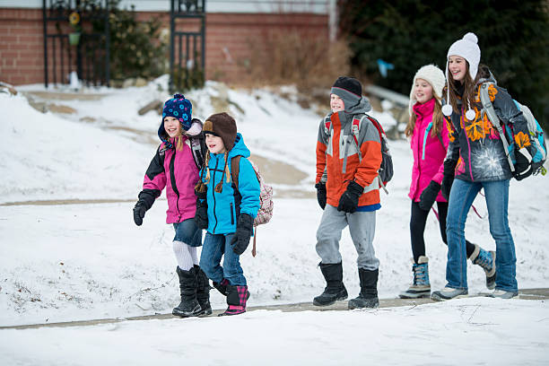 istock Kids walking to school 520281913