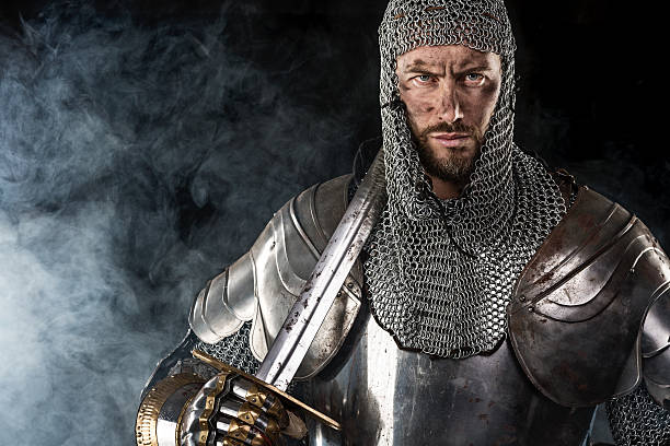 istock Medieval Warrior with Chain Mail Armour and Sword 520283194