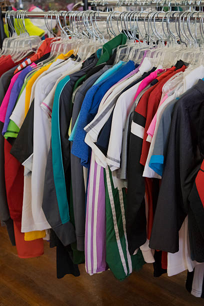 istock Clothing hanging on a rack in a store 520285268