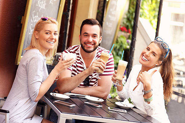 istock Group of friends in a cafe 520285822