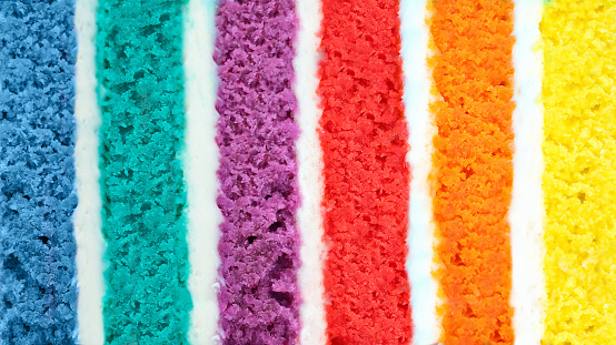 Background of multicolor sixlayer cake. Low shallow of depth