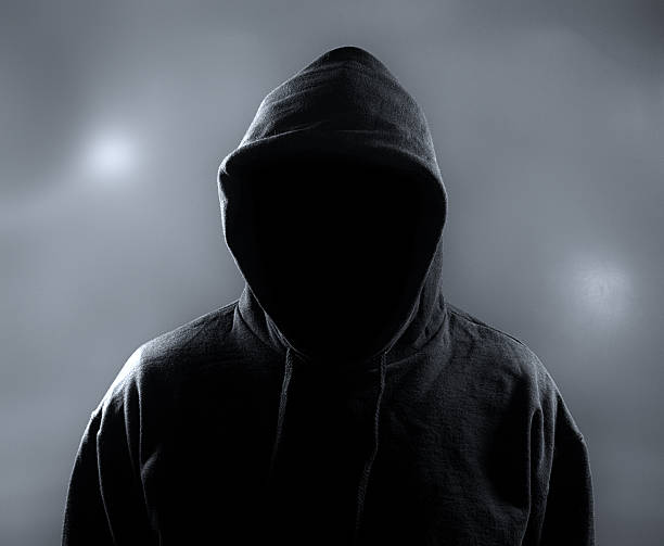 istock Unrecognized, Hooded Person in Night 520287538