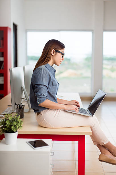 istock Beautiful young graphic designer working on her desk 520290158