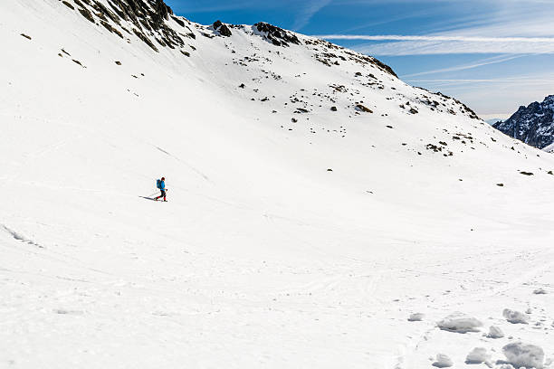 istock Mountaineer descends a snowy slope. 520290978