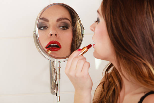 istock Young girl making makeup 520291194