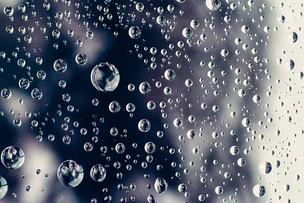 istock Close up of water drops in black 520292076
