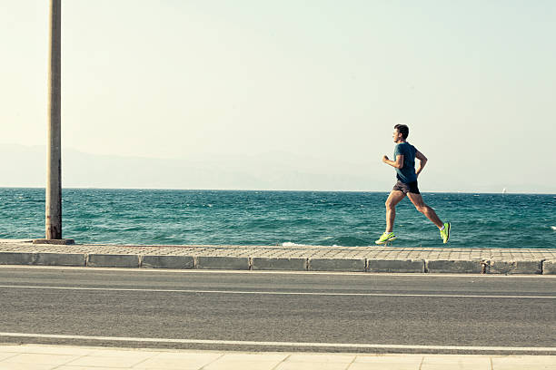 running outdoor on pavement seaside