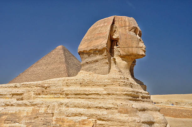 istock Sphinx against of Giza pyramid 520293990