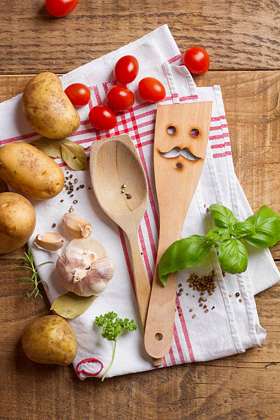 istock Wooden spoon, spatula and spices 520294034