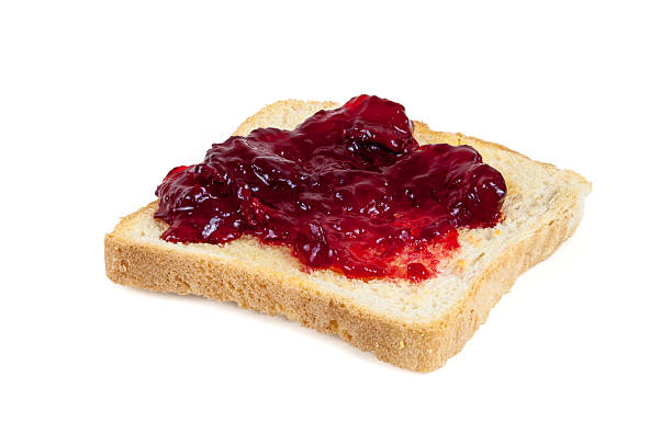 istock Toast with jam isolated on white background 520294345