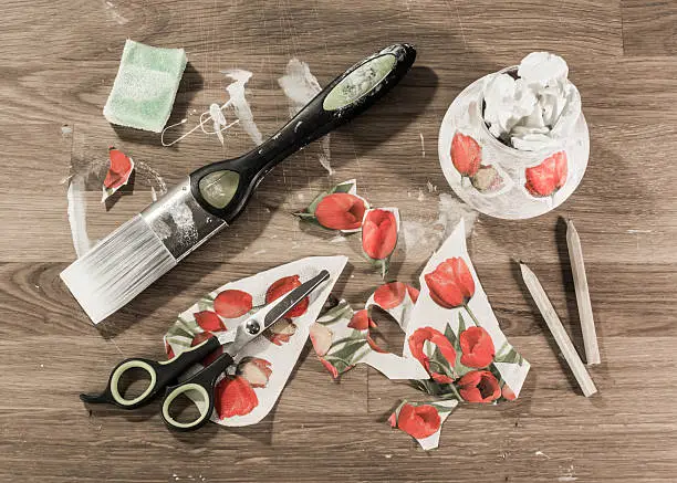 Photo of Decoupage tools on wooden table,