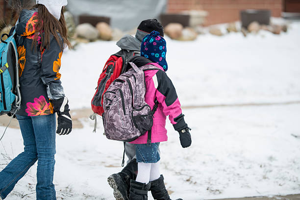 istock Kids walking to school 520295509
