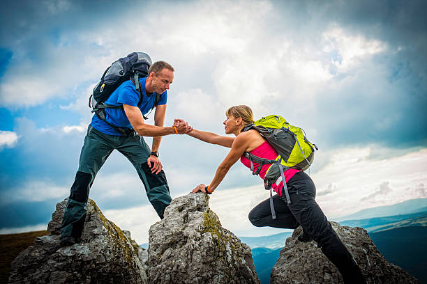 istock Couple Hiking in Mountains 520295671