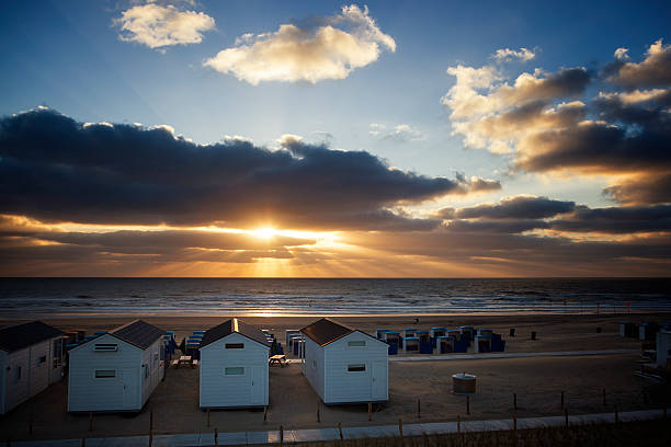 istock Beach huts, sunset at North Sea 520296363
