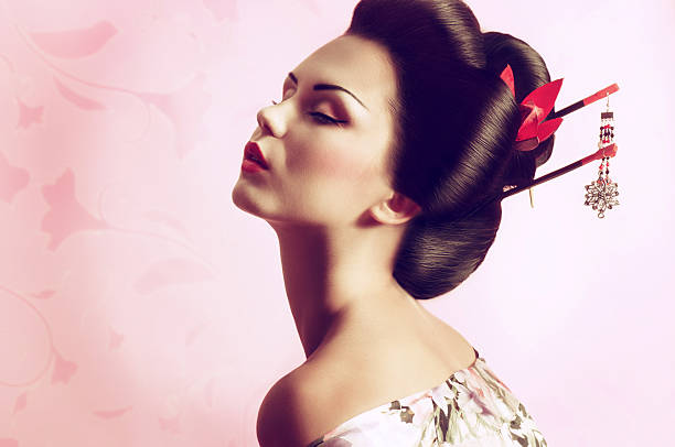 Portrait of a Japanese geisha woman stock photo