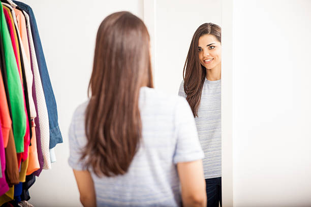 istock Woman trying clothes in a dressing room 520296884
