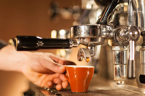 istock Barista making a cup of coffee 520297561