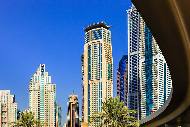 istock Dubai, UAE: Marina towers, shot from under bridge; morning sunlight 520300235