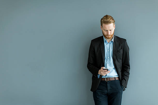 istock Businessman with a phone 520320922