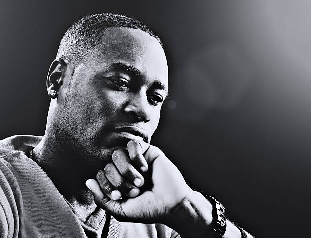 istock Black--and--white portrait of serious man, deep in thought 520321730