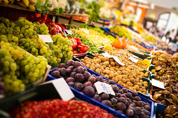 fresh fruits and vegetables fresh fruits and  vegetables at a market hall market hall stock pictures, royalty-free photos & images