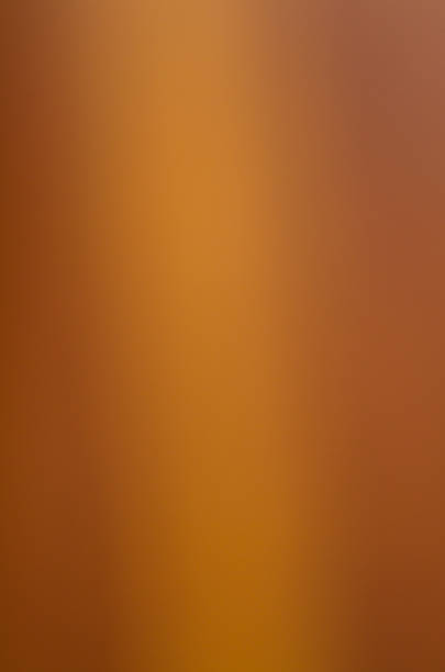 istock the blurred abstract background gold brown color 520322599