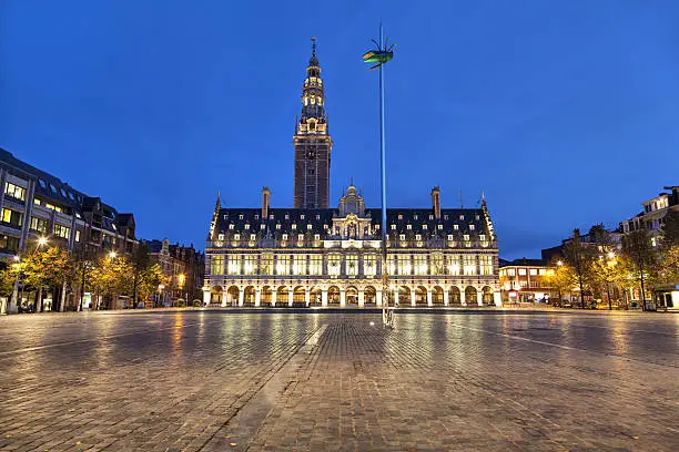 Ladeuze square with building of the university library of Leuven in the evening
