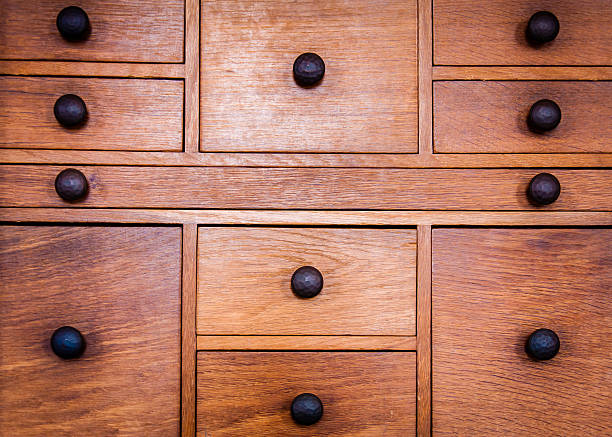 istock Closeup on old vintage wooden drawers 520324875