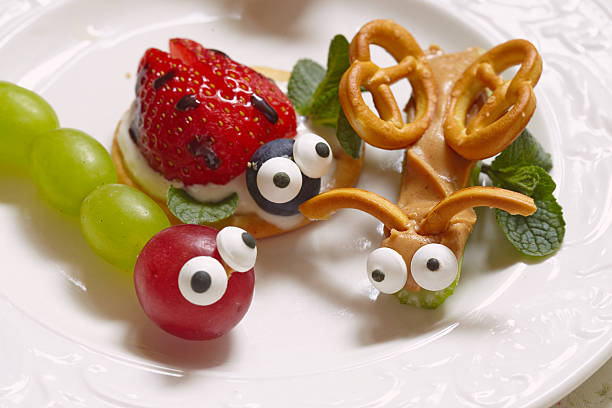 istock Funny beetles from grapes and berries 520325050