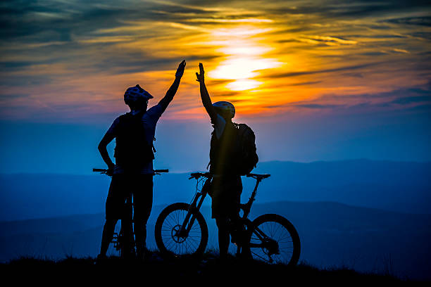 istock Bikers Giving a High-Five at the Destination 520325443
