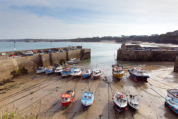 istock Boats in Newquay harbour North Cornwall England UK 520326021