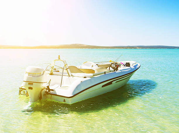istock Motorboat moored in idyllic lagoon on sunny day 520327734