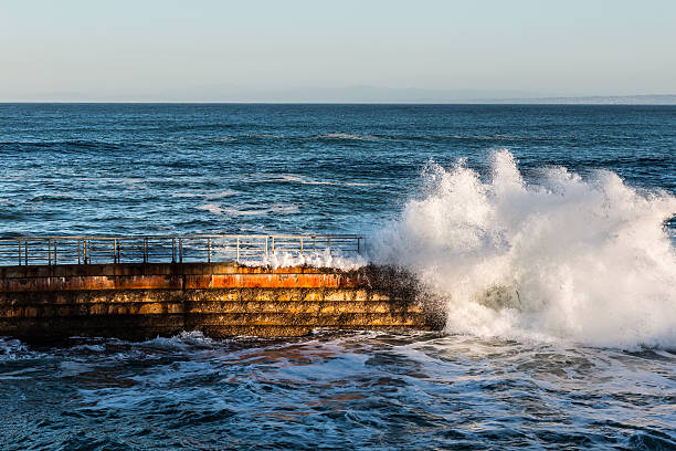 istock La Jolla Children's Pool at High Tide with Crashing Wave 520328898