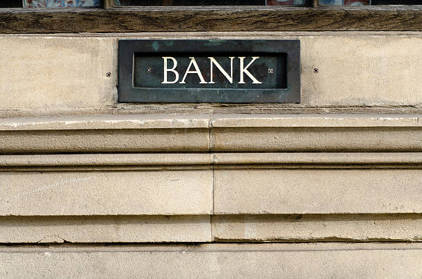 istock Bank sign painted on letterbox in wall 520328908