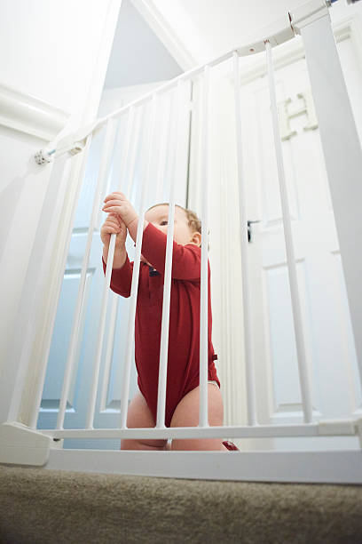 istock Baby safety gate on stairs 520329470