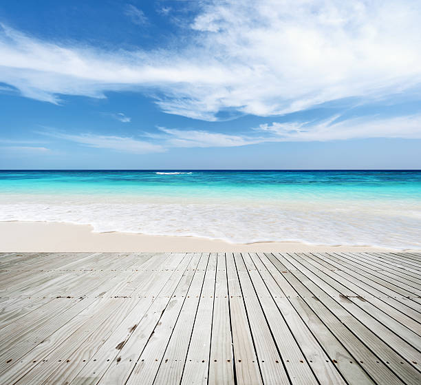 istock Wooden platform beside tropical sea 520331006