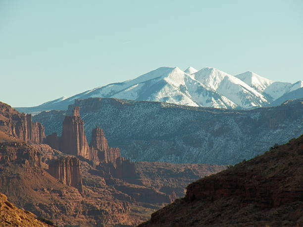 istock Rock Formation with magestic snow covered mountains 520360339