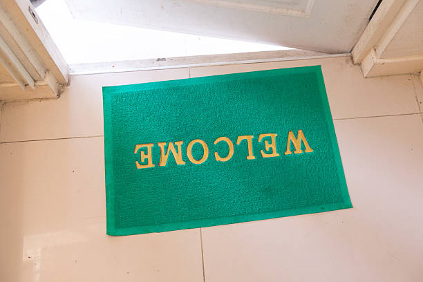 istock Welcome home doormat with copen door 520361552