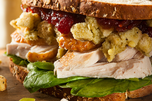 Homemade Leftover Thanksgiving Dinner Turkey Sandwich with Cranberries and Stuffing