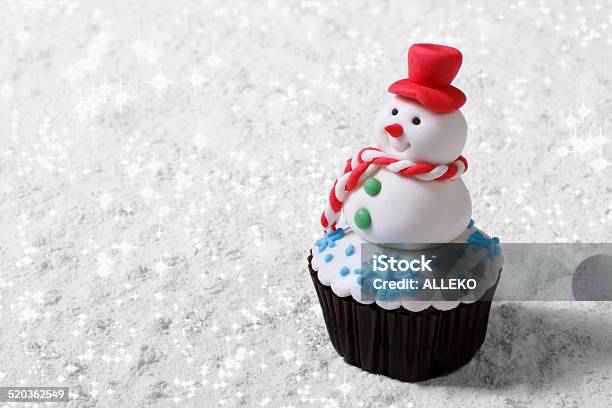 Cupcake Christmas Snowman On White Snow Horizontal Stock Photo - Download Image Now